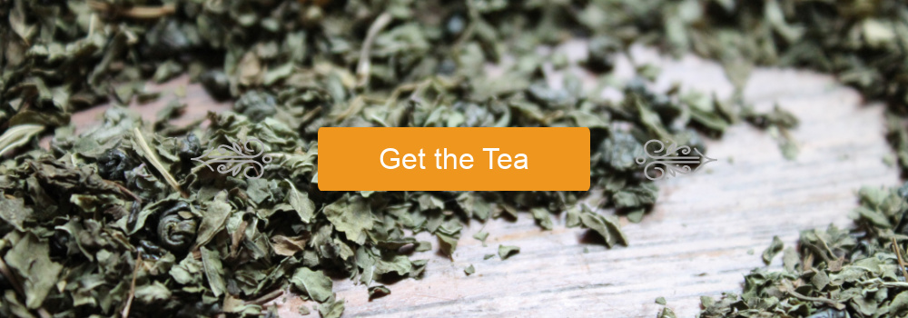 "Get the Tea" button with scroll embellishments upon a background of Moroccan Mint tea